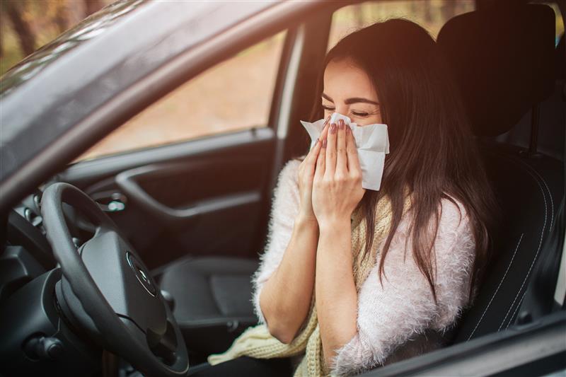 young-woman-with-handkerchief-sick-girl-has-runny-nose-female-model-makes-cure-common-cold-car